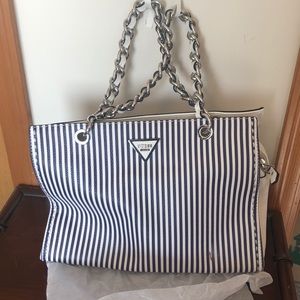 Navy blue and white stripped Guess Purse